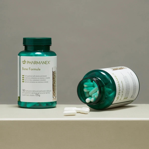 pharmanex-bone-formula-bottle-closed-and-open-pills-lifestyle-image.jpg