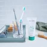nu-skin-ap24-toothbrush-anti-plaque-toothpaste-lifestyle-image.jpg